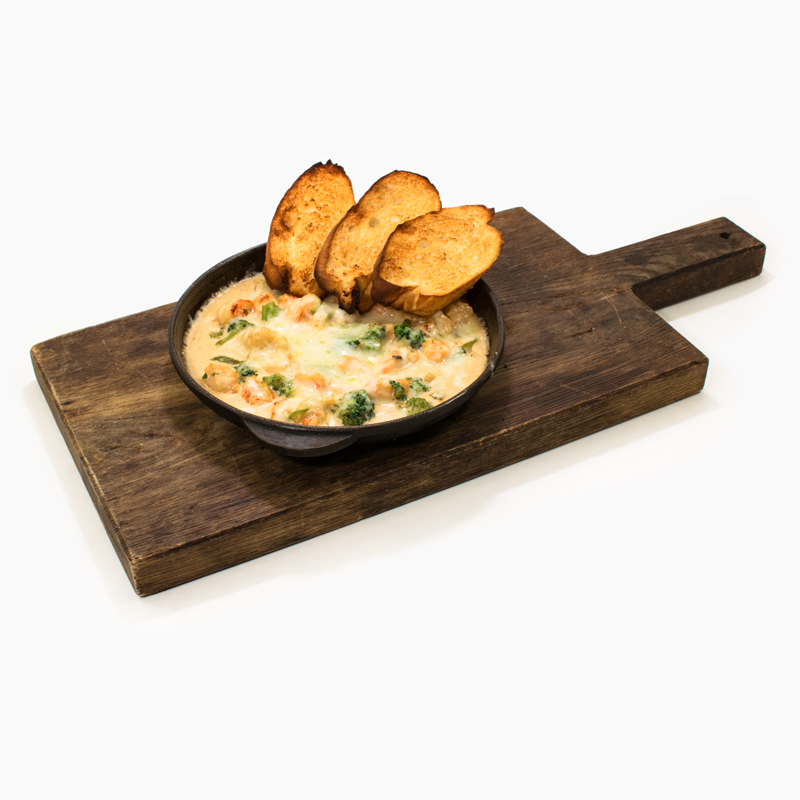 Креветки в сливочном соусе с овощами