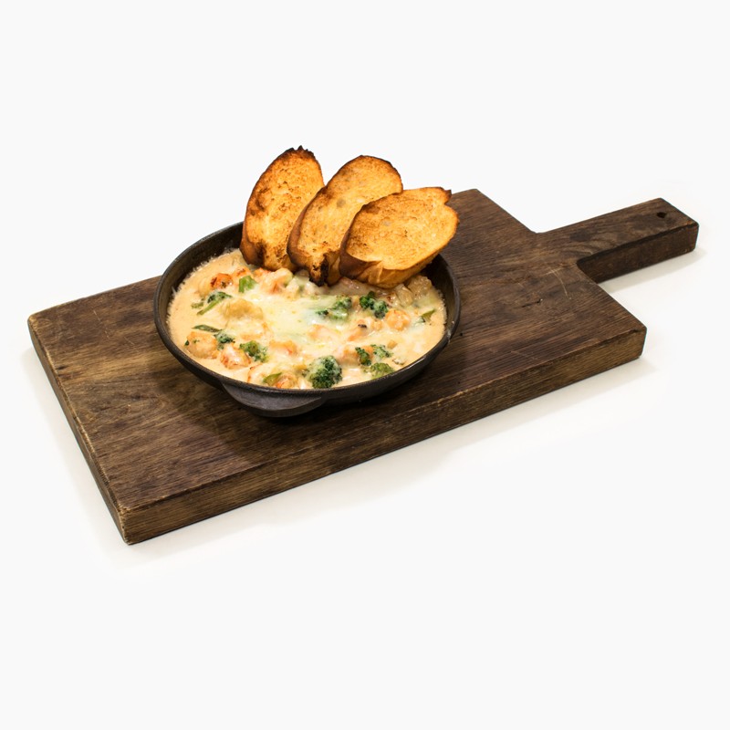 Креветки в сливочном соусе с овощами